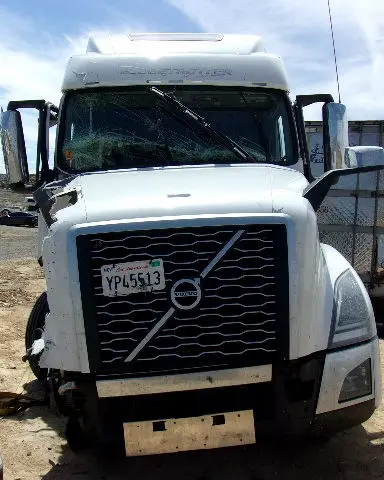 Appraiser evaluating heavy equipment damage